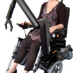 robotic arm attached to wheelchair